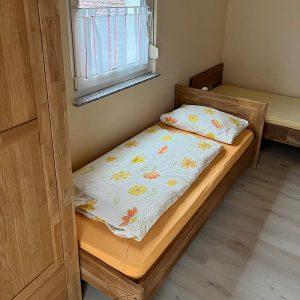 Schlafzimmer mit Einzelbetten Ferienwohnung Trollinger